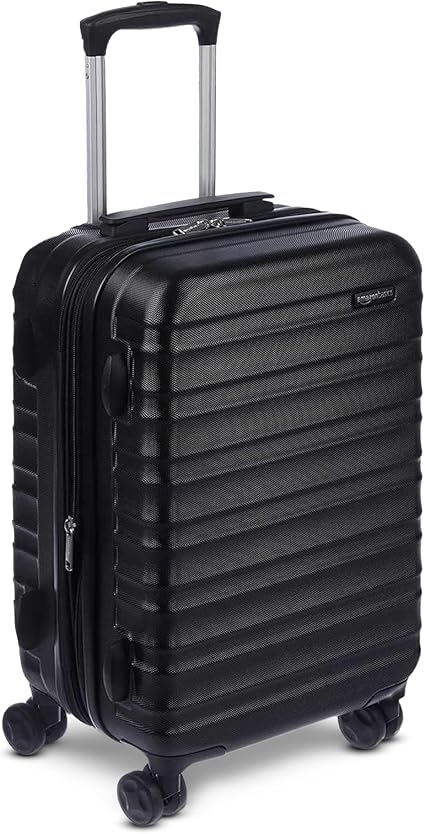 Amazon Basics Rose Gold Expandable Hardside CarryOn Luggage