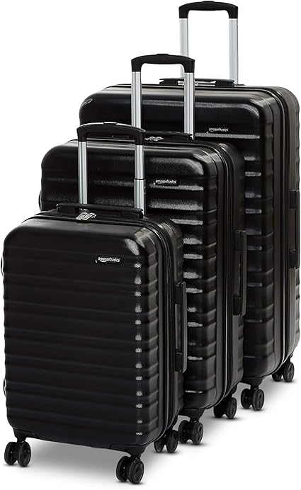 Amazon Basics Rose Gold Expandable Hardside CarryOn Luggage